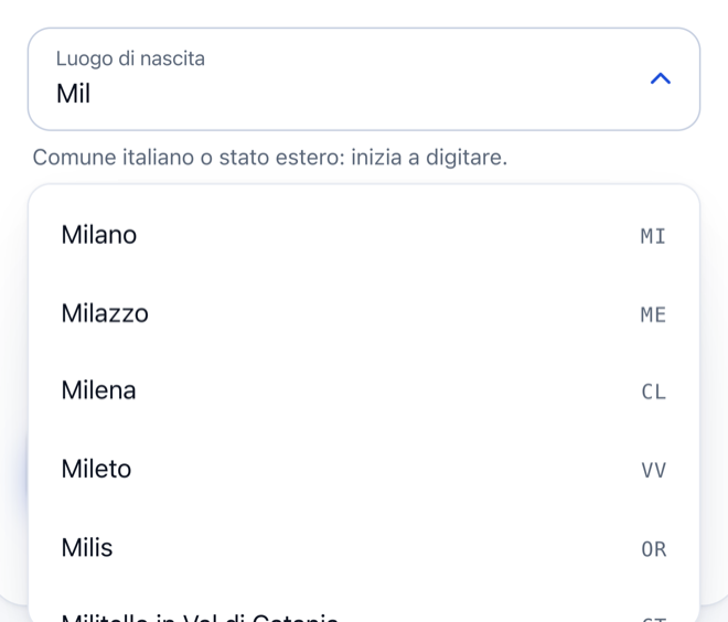 Il campo Luogo di nascita con le prime lettere digitate e l'elenco dei suggerimenti: Milano MI, Milazzo ME, Milena CL.